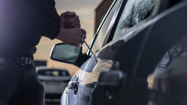 man stealing car