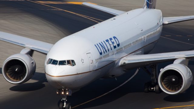 An American airline, United, B777 plane is taxiing to the gate after her arrival at the Dubai International Airport as seen on December 14, 2013.