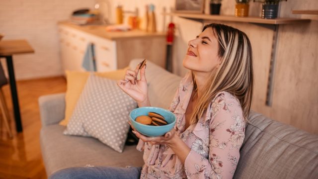 woman eating cookie