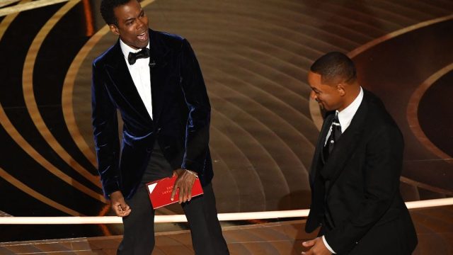 Chris Rock and Will Smith on stage at the 2022 Oscars