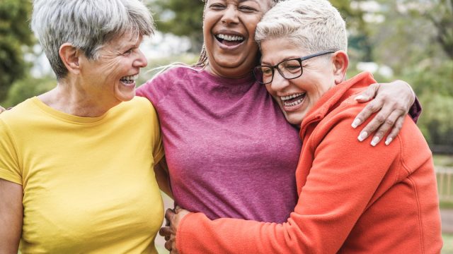 enior women having fun together after sport workout outdoor