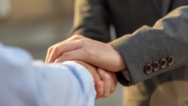 holding hands in trust