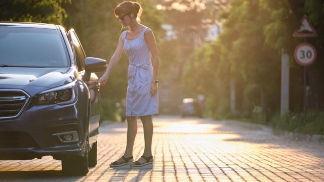woman and car