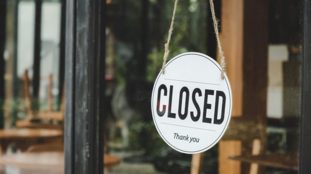 closed sign in store window
