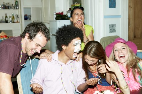 group of friends playing a prank on each other