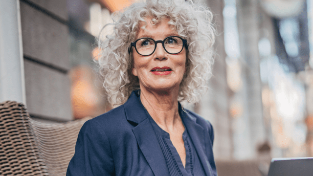Older woman with curly gray hair