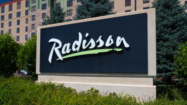 A sign for a Radisson Hotel