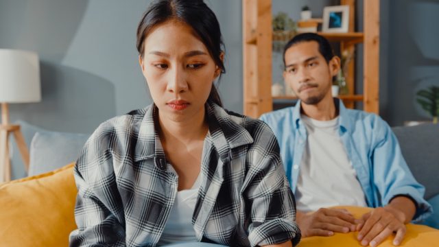 upset couple on couch
