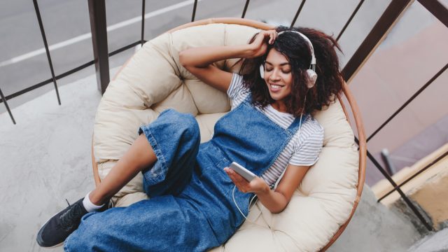 woman sitting in a chair relaxing