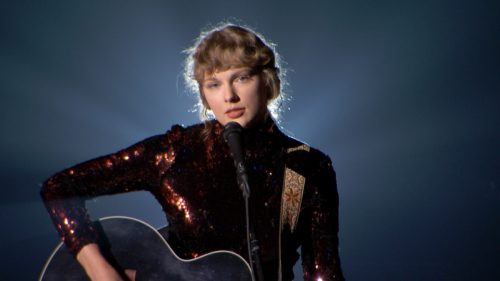 Taylor Swift performing at the ACM awards in 2020.