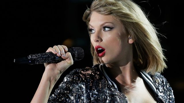 Taylor Swift performing on her 1989 world tour.