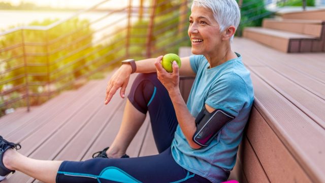 Portrait,Of,A,Beautiful,Older,Woman,With,Green,Healthy,Food