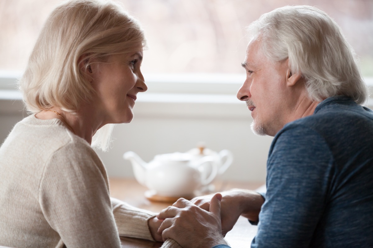 Older Couple Talking and holding hands