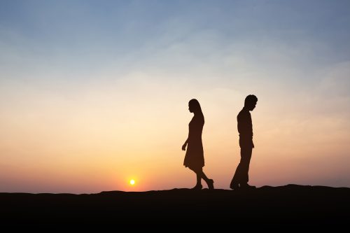 couple walking away from one another 