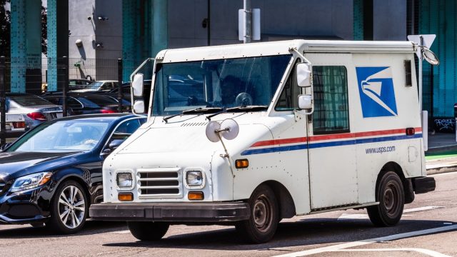 Aug 10, 2019 San Francisco / CA / USA - USPS vehicle making deliveries in San Francisco