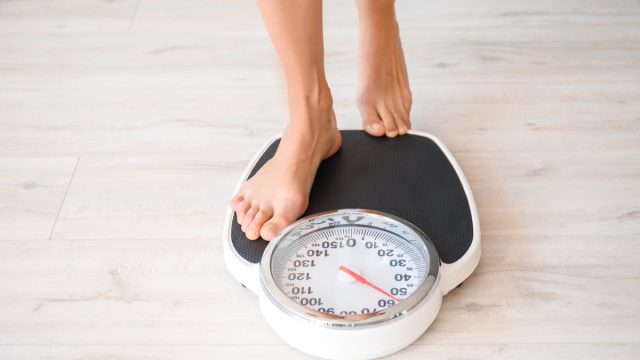 Person Getting on a Scale