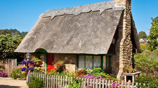 A thatched-roof cottage in Carmel, California.