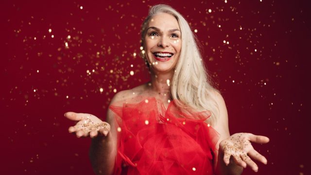 older woman red dress new year's eve