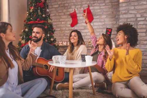 Friends celebrating Christmas at home