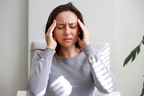 Woman with headache.