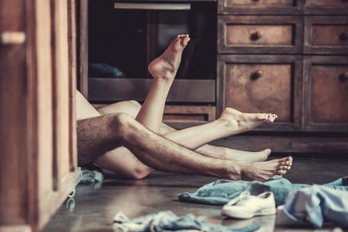 couple having sex on the floor