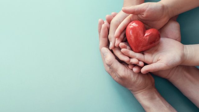 Layered Hangs Holding Ceramic Heart