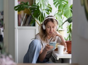 woman listening to podcast