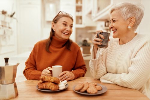 senior women in sweaters