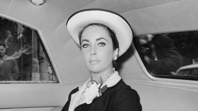 Elizabeth Taylor in a car in Paris circa 1960s