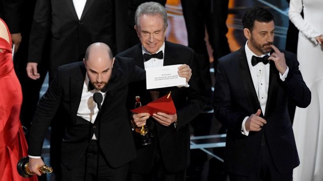 Jordan Horowitz, Warren Beatty, and Jimmy Kimmel onstage at the 2017 Oscars