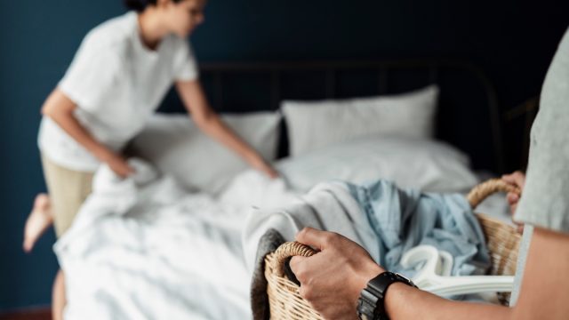 A,Wife,Trying,To,Remove,The,Bed,Sheet,And,Blanket