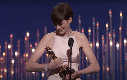 Anne Hathaway accepting her Oscar in 2013