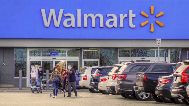Walmart store shoppers wear corona virus protective masks, Peabody Massachusetts USA, May 2, 2020
