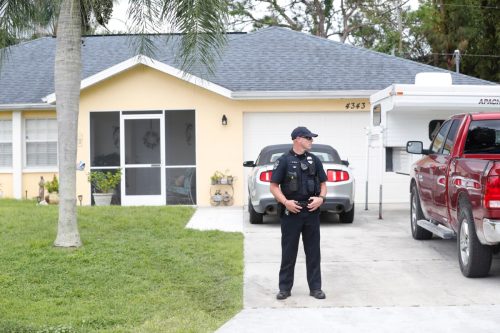police officer outside of brian laundrie's home