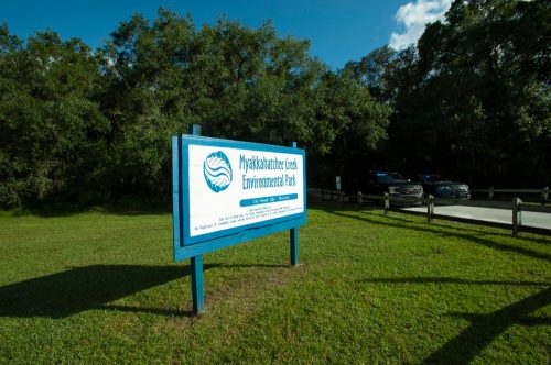 police cars outside of Myakkahatchee Creek Environmental Park