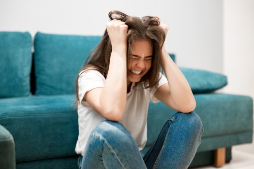 Young Woman Stressed and Overthinking