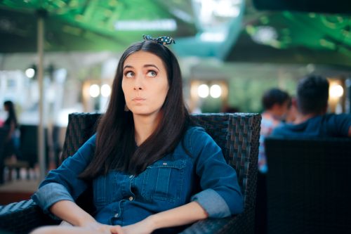 Woman eavesdropping snooping and spying on her ex