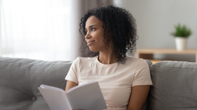 Woman Sitting and Reading