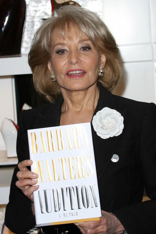 Barbara Walters holding her book "Audition: A Memoir" in 2008