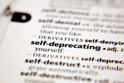 dictionary definition of self-deprecating; best put downs for oneself