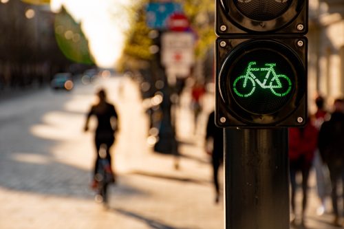 silhouette of cyclist and bike on blurred background