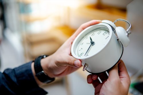 winding the clock for an april fools prank