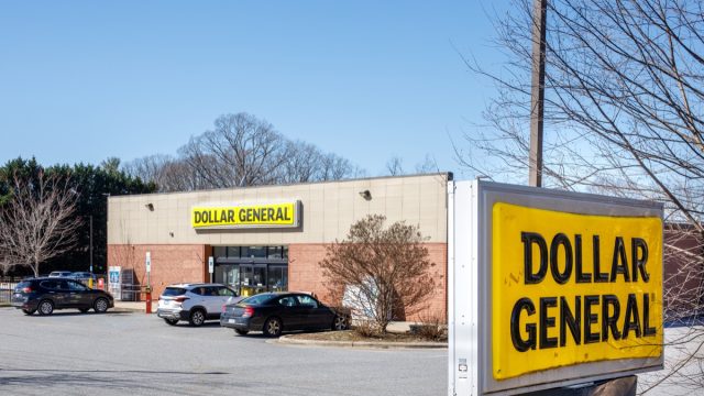 Dollar General store, slightly dirty monument street sign