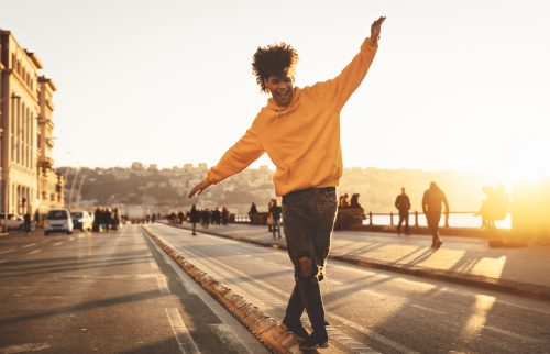 young man outside having fun