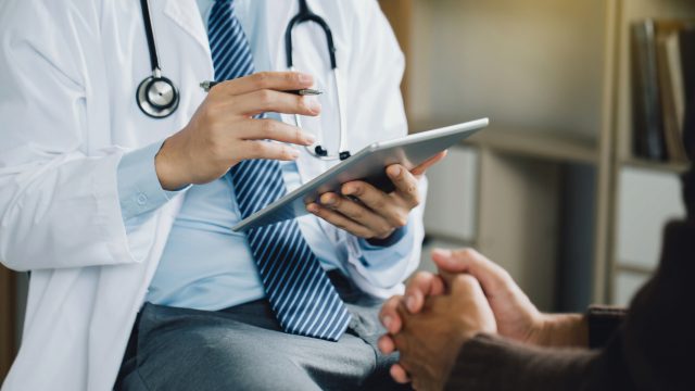Doctor speaking with patient.
