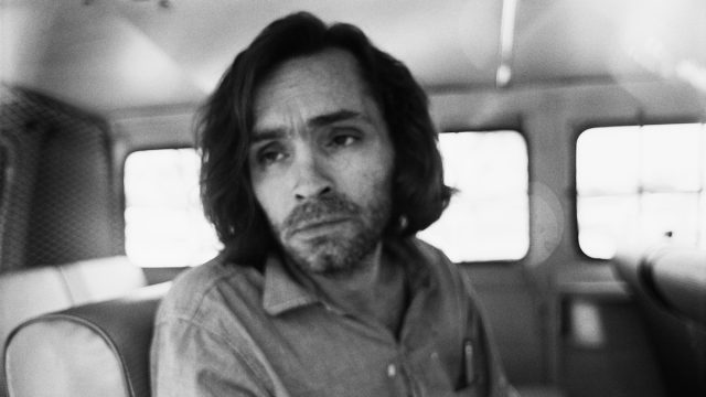 Charles Manson in a police van in 1970
