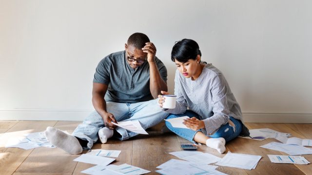 Couple managing the debt