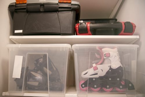 inline skates in plastic bins