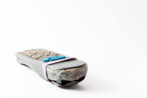 broken remote taped together