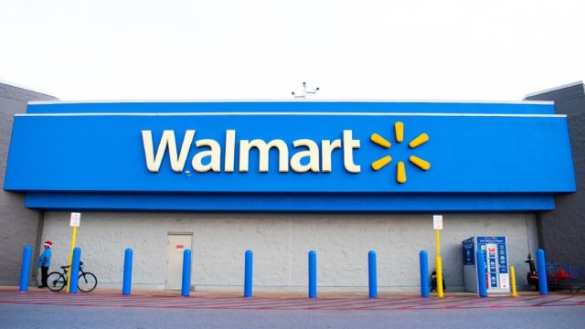 A closeup of a Walmart store sign